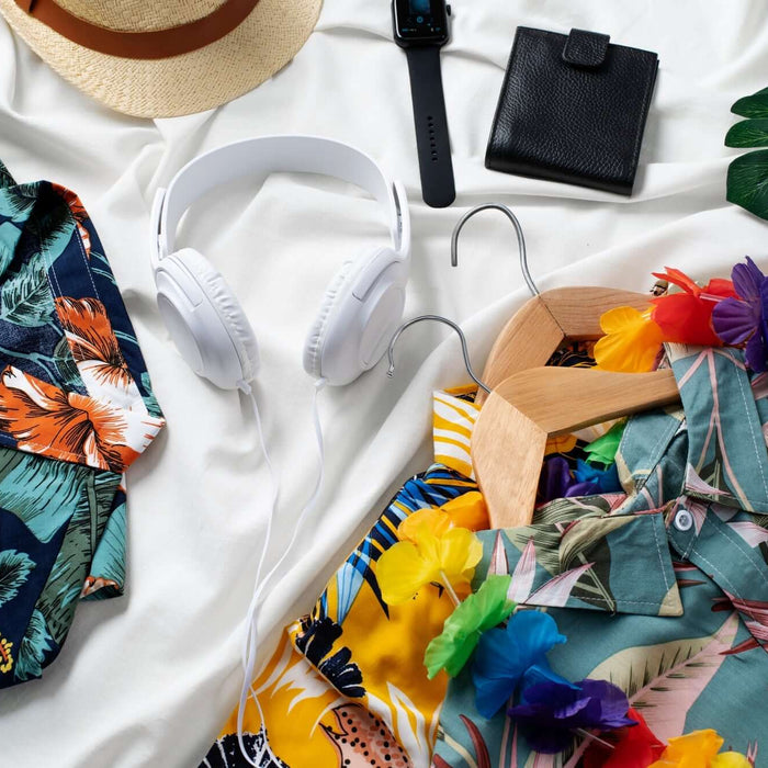 Colorful Hawaiian shirts and summer accessories on display