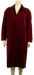 Mannequin wearing a long red velvet double-breasted coat with black buttons and a dark collar.