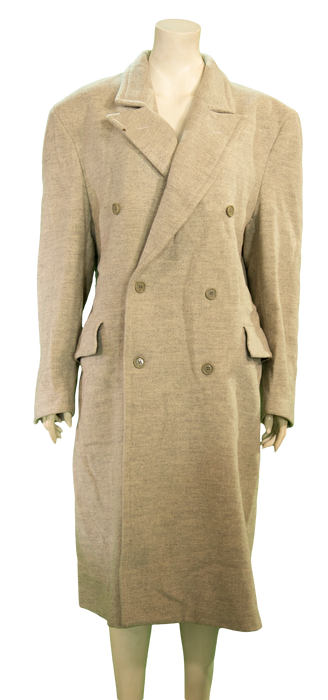 Beige double-breasted wool coat with wide lapels and side pockets on a mannequin