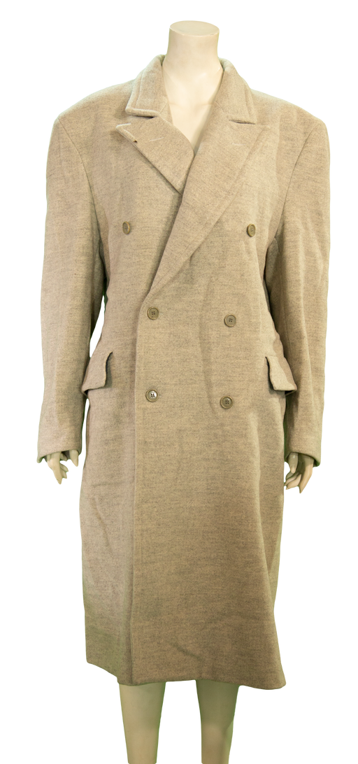 Beige double-breasted wool coat with wide lapels and side pockets on a mannequin