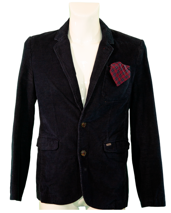 Black blazer with red plaid pocket square on mannequin