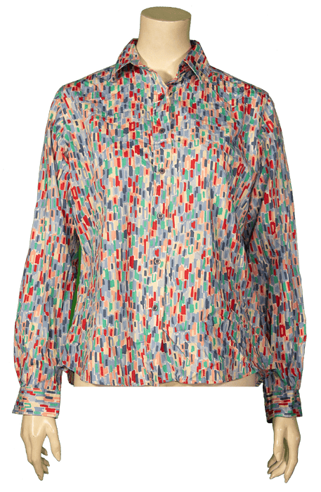 Multicolored patterned shirt with a collar and long sleeves displayed on a mannequin