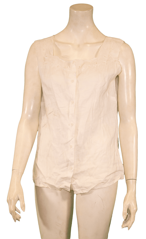 White sleeveless button-up blouse on mannequin