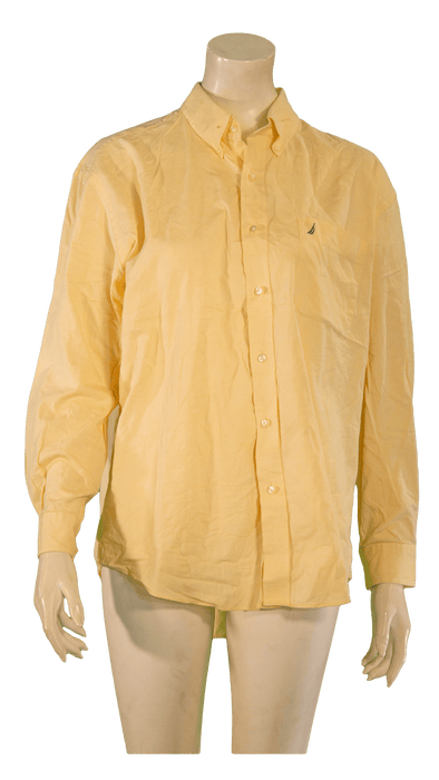 Yellow long-sleeve button-up shirt on a mannequin for fashionable casual wear