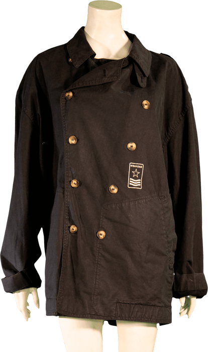 Vintage black double-breasted nautical jacket with gold buttons on a mannequin.