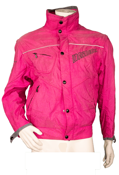 Bright pink Dainese motorcycle jacket with high collar and zipper pockets for stylish and functional riding gear.