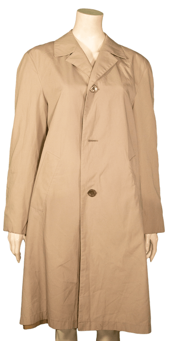 Beige trench coat on mannequin showcasing stylish outerwear for fashion enthusiasts