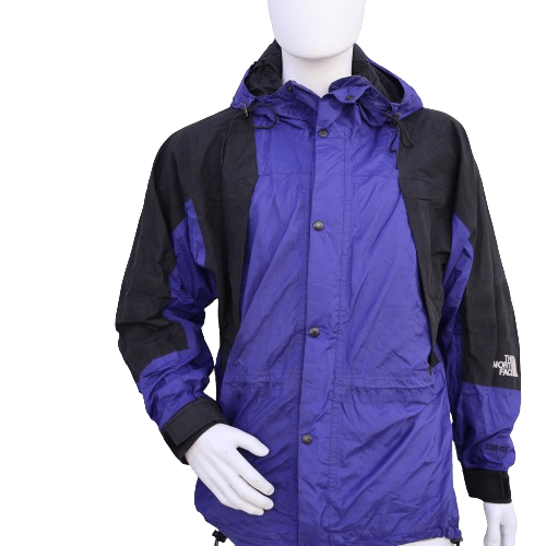 Vintage North Face purple and black raincoat from the 90s displayed on a mannequin.