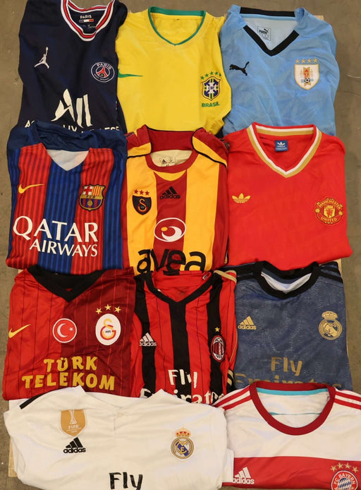 Assorted vintage football t-shirts mix featuring various team logos and colors, available in wholesale packs from the 90s onwards.