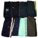 "Collection of sports pants in various colors and brands including Nike, Adidas, and Ellesse"