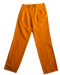 Bright orange tailored pants with a pleated front and a relaxed fit.