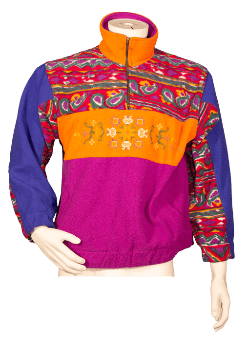 Vintage colorful jacket with vibrant patterns and embroidered designs, featuring purple, orange, and pink hues.