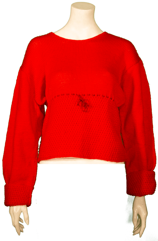 Red knit sweater on a mannequin with long sleeves and a loose fit, ideal for cozy and stylish winter wear.