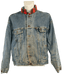 Vintage blue denim jacket with brown buttons and a red flannel-lined collar displayed on a mannequin.