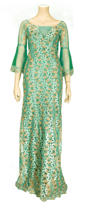 Elegant green and beige floor-length gown with intricate lace detailing and sheer three-quarter sleeves displayed on a mannequin.