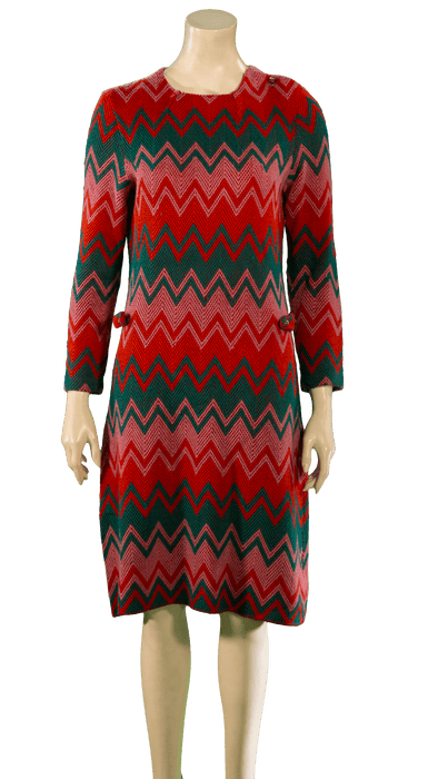 Red and green chevron pattern long-sleeve dress displayed on a mannequin