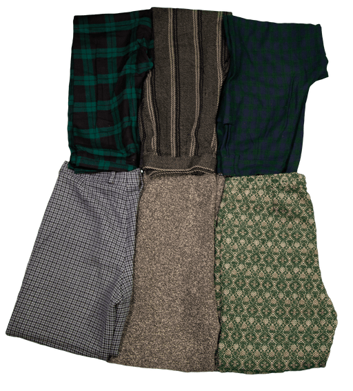 Various patterned green and gray pants neatly arranged in a flat lay display