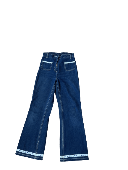 Blue high-waisted wide-leg jeans with front pockets and white trim detail on the hem, perfect for a retro fashion look.