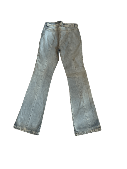 Vintage flared gray jeans styled with subtle fading, authentic 70's fashion statement