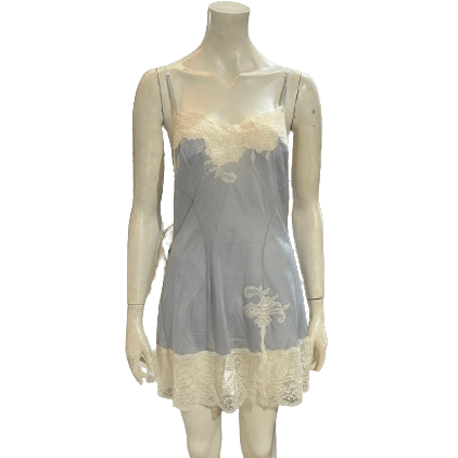 Vintage light blue lingerie dress with lace details from a mixed pack of 70s, 80s, 90s, and 00s, available wholesale.