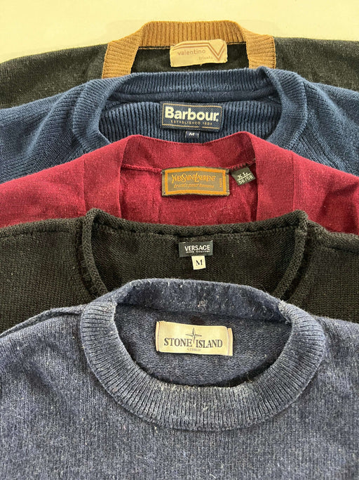 Vintage luxury jumpers assortment featuring brands like Valentino, Barbour, Yves Saint Laurent, Versace, and Stone Island in various colors.