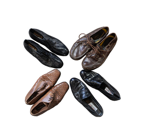 A variety of men's dress shoes arranged in a circle, showcasing different styles and colors including black, brown, and woven leather designs.