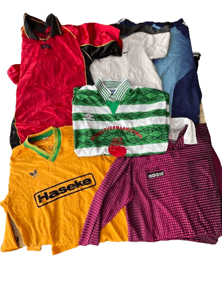 Vintage wholesale sport T-shirts from 70s, 80s, 90s, 00s, European and USA mix, featuring retro designs and vibrant colors.