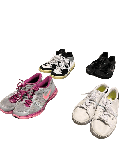 Four pairs of athletic shoes in different styles and colors placed on a white background.