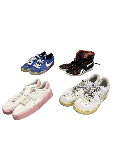 Four pairs of stylish sneakers including blue, black, pink, and white colorways, arranged in a display.