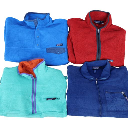 Vintage Patagonia fleeces mix from different eras in red, blue, and green, showcasing high-quality wholesale vintage fashion.