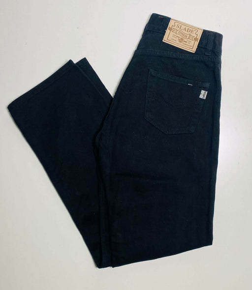 High-waisted black denim jeans with front and back pockets, featuring a leather patch on the waistband from SLABZ.