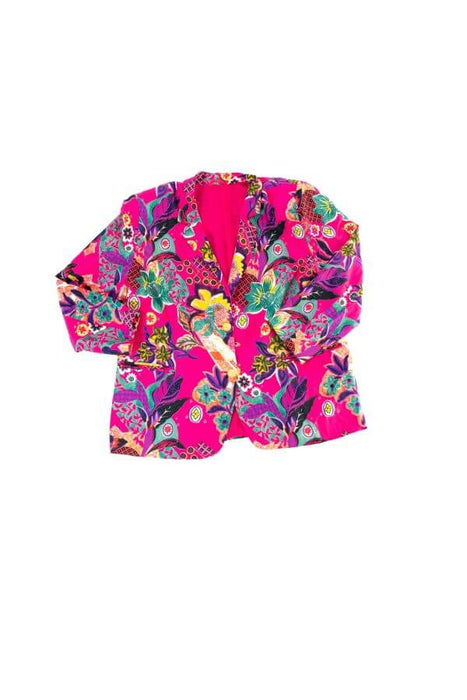 Colorful floral-patterned pink blazer, vibrant fashion statement piece